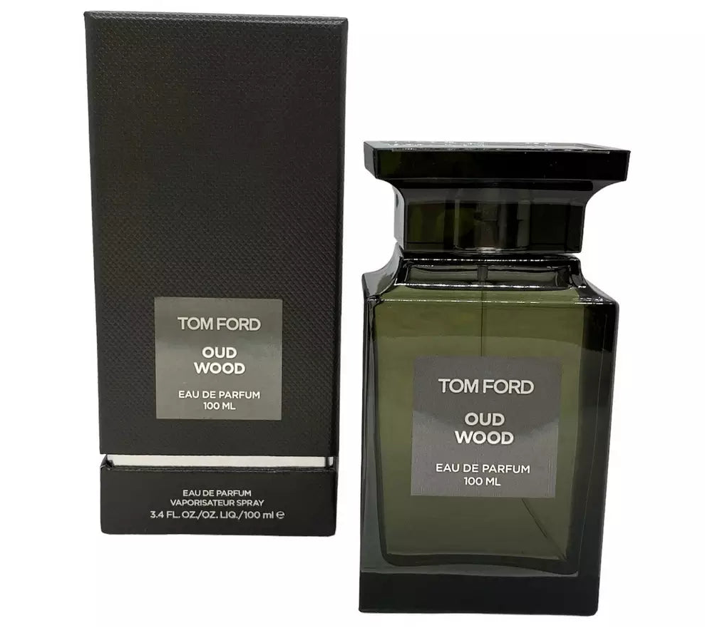 Tom Ford Old Wood Eau de Parfum 100ml bottle next to its black textured packaging box, on a plain white background.
